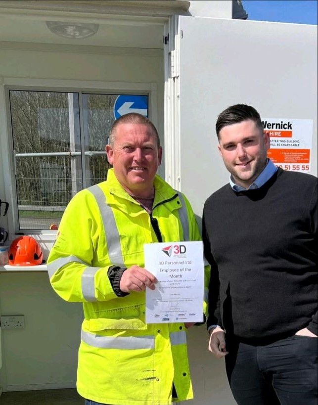 Lee is presented with his award by Connor on site
