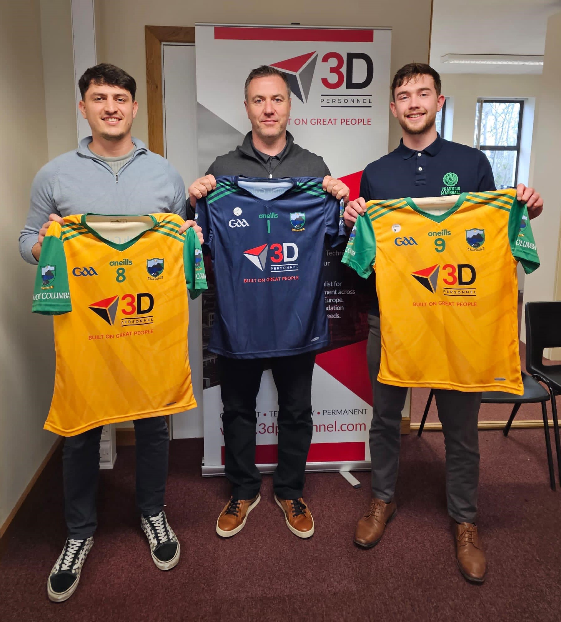 3D's Christopher, Michael and Ronan display their club shirts